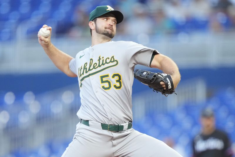 May 2, 2025; Miami, Florida, USA;  Oakland Athletics pitcher Gunnar Hoglund (53) pitches in the first inning against the Miami Marlins at loanDepot Park. Mandatory Credit: Jim Rassol-Imagn Images