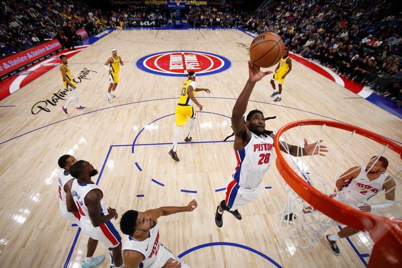 DETROIT, MI - OCTOBER 23:  Isaiah Stewart #28 of the Detroit Pistons grabs the rebound during the game against the Indiana Pacers on October 23, 2024 at Little Caesars Arena in Detroit, Michigan. NOTE TO USER: User expressly acknowledges and agrees that, by downloading and/or using this photograph, User is consenting to the terms and conditions of the Getty Images License Agreement. Mandatory Copyright Notice: Copyright 2024 NBAE (Photo by Brian Sevald/NBAE via Getty Images)