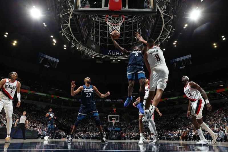 MINNEAPOLIS, MN -  MARCH 4: Anthony Edwards #5 of the Minnesota Timberwolves drives to the basket during the game against the Portland Trail Blazers on March 4, 2024 at Target Center in Minneapolis, Minnesota. NOTE TO USER: User expressly acknowledges and agrees that, by downloading and or using this Photograph, user is consenting to the terms and conditions of the Getty Images License Agreement. Mandatory Copyright Notice: Copyright 2024 NBAE (Photo by David Sherman/NBAE via Getty Images)