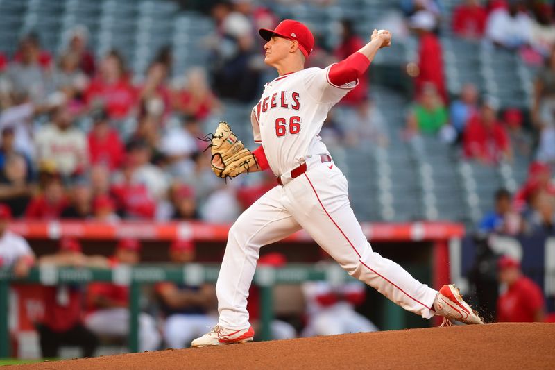 Aug 30, 2024; Anaheim, California, USA; Los Angeles Angels pitcher Samuel Aldegheri (66) throws against the Seattle Mariners during the first inning in his major league debut at Angel Stadium. Mandatory Credit: Gary A. Vasquez-USA TODAY Sports