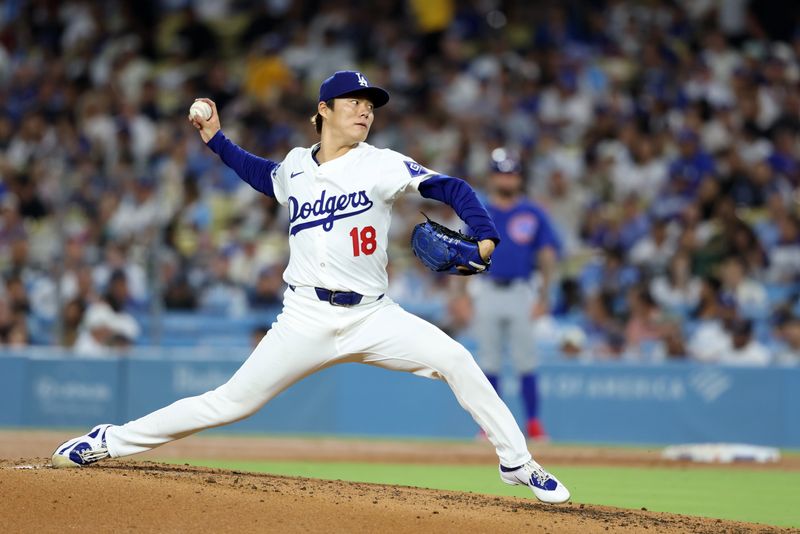 Sep 10, 2024; Los Angeles, California, USA;  Los Angeles Dodgers starting pitcher Yoshinobu Yamamoto (18) pitches during the fourth inning against the Chicago Cubs at Dodger Stadium. Mandatory Credit: Kiyoshi Mio-Imagn Images