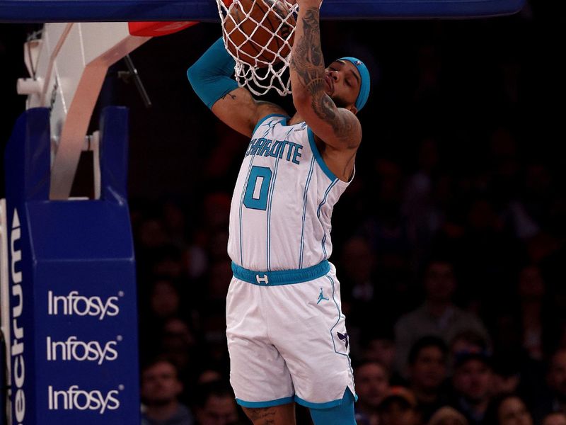 NEW YORK, NEW YORK - NOVEMBER 28:  Miles Bridges #0 of the Charlotte Hornets dunks against the New York Knicks during the first half of an NBA In-Season Tournament game at Madison Square Garden on November 28, 2023 in New York City. NOTE TO USER: User expressly acknowledges and agrees that, by downloading and or using this photograph, User is consenting to the terms and conditions of the Getty Images License Agreement. (Photo by Elsa/Getty Images)