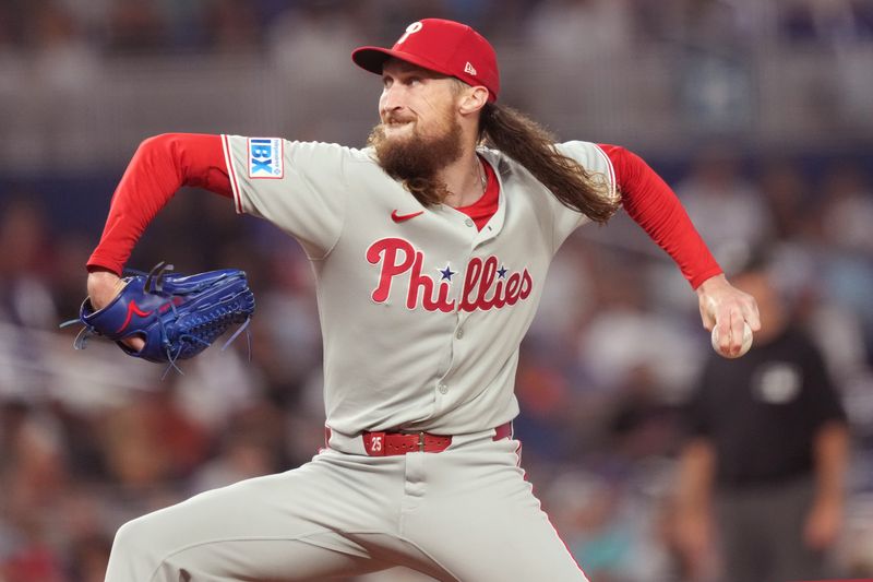 Sep 6, 2025; Miami, Florida, USA;  Philadelphia Phillies pitcher Matt Strahm (25) pitches in the eighth inning against the Miami Marlins at loanDepot Park. Mandatory Credit: Jim Rassol-Imagn Images