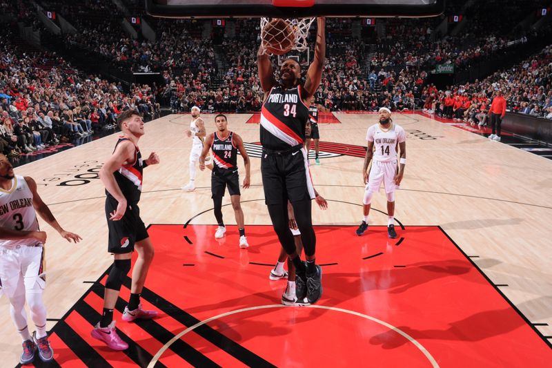 PORTLAND, OR - OCTOBER 25: Jabari Walker #34 of the Portland Trail Blazers dunks the ball during the game against the New Orleans Pelicans on October 25, 2024 at the Moda Center Arena in Portland, Oregon. NOTE TO USER: User expressly acknowledges and agrees that, by downloading and or using this photograph, user is consenting to the terms and conditions of the Getty Images License Agreement. Mandatory Copyright Notice: Copyright 2024 NBAE (Photo by Cameron Browne/NBAE via Getty Images)