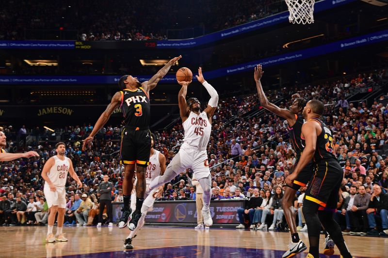 PHOENIX, AZ - APRIL  3: Donovan Mitchell #45 of the Cleveland Cavaliers drives to the basket during the game against the Phoenix Suns on April 3, 2024 at Footprint Center in Phoenix, Arizona. NOTE TO USER: User expressly acknowledges and agrees that, by downloading and or using this photograph, user is consenting to the terms and conditions of the Getty Images License Agreement. Mandatory Copyright Notice: Copyright 2024 NBAE (Photo by Kate Frese/NBAE via Getty Images)