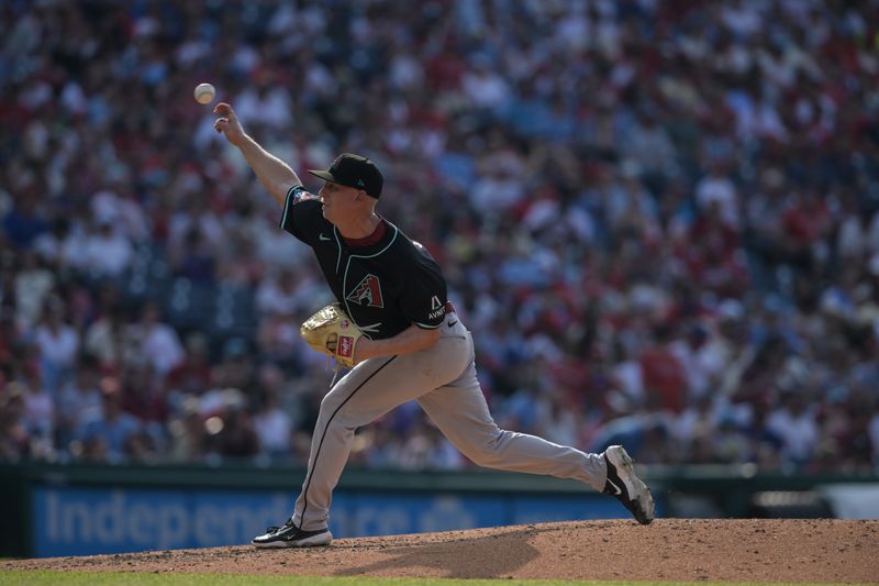 Jun 22, 2024; Philadelphia, Pennsylvania, USA;  Arizona Diamondbacks pitcher Scott McGough (30) pitches in the fifth inning against the Philadelphia Phillies at Citizens Bank Park. The Phillies won 12-1. Mandatory Credit: John Geliebter-USA TODAY Sports