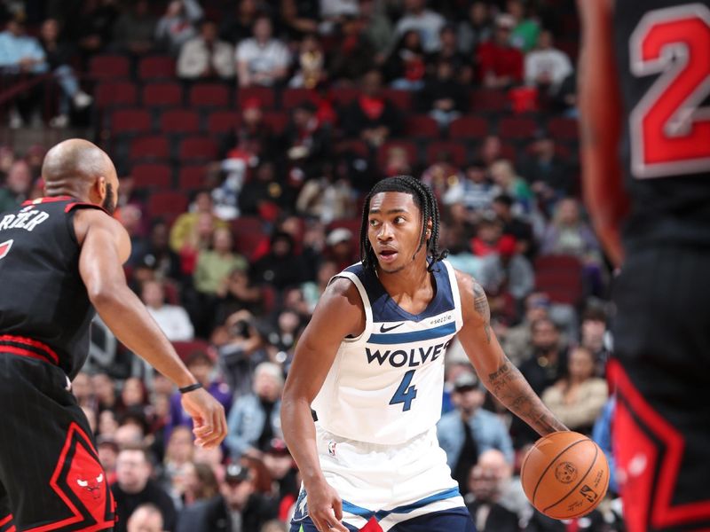 CHICAGO, IL - NOVEMBER 7: Rob Dillingham #4 of the Minnesota Timberwolves handles the ball during the game against the Chicago Bulls on November 7, 2024 at United Center in Chicago, Illinois. NOTE TO USER: User expressly acknowledges and agrees that, by downloading and or using this photograph, User is consenting to the terms and conditions of the Getty Images License Agreement. Mandatory Copyright Notice: Copyright 2024 NBAE (Photo by Jeff Haynes/NBAE via Getty Images)