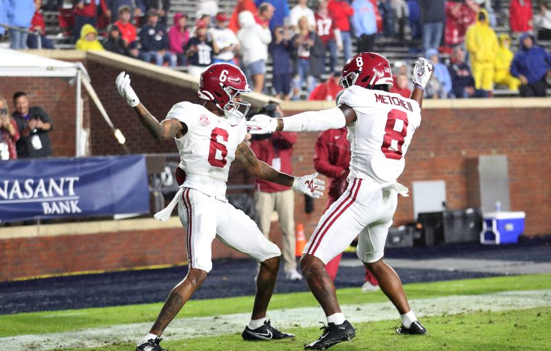 Oct 10, 2020; Oxford, MX, USA; Alabama wide receiver DeVonta Smith (6) and wide receiver John Metchie III (8) celebrate a touchdown against Mississippi at Vaught-Hemingway Stadium. Mandatory Credit: Kent Gidley via USA TODAY Sports