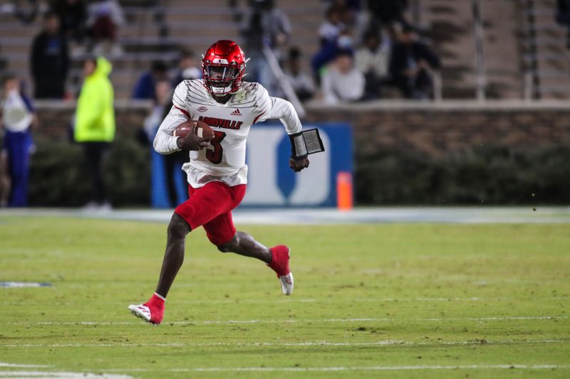 Nov 18, 2021; Durham, North Carolina, USA;  Louisville Cardinals quarterback Malik Cunningham (3) runs with the ball during the 1st half of the game against the Louisville Cardinals at Wallace Wade Stadium. Mandatory Credit: Jaylynn Nash-USA TODAY Sports