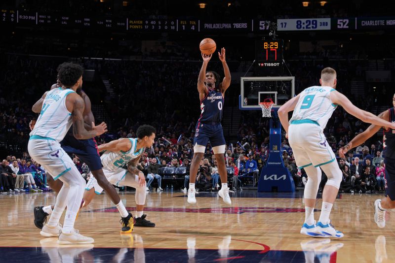 PHILADELPHIA, PA - MARCH 16:  Tyrese Maxey #0 of the Philadelphia 76ers shoots a three point basket during the game against the Charlotte Hornets on March 16, 2024 at the Wells Fargo Center in Philadelphia, Pennsylvania NOTE TO USER: User expressly acknowledges and agrees that, by downloading and/or using this Photograph, user is consenting to the terms and conditions of the Getty Images License Agreement. Mandatory Copyright Notice: Copyright 2024 NBAE (Photo by Jesse D. Garrabrant/NBAE via Getty Images)