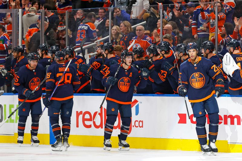 Dec 14, 2023; Edmonton, Alberta, CAN; The Edmonton Oilers celebrate a goal scored by defensemen Darnell Nurse (25) during the second period against the Tampa Bay Lightning at Rogers Place. Mandatory Credit: Perry Nelson-USA TODAY Sports