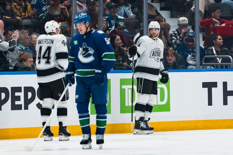 Apr 14, 2026; Vancouver, British Columbia, CAN; Vancouver Canucks forward Aatu Raty (54) reacts as defenseman Mikey Anderson (44) and forward Alex Laferriere (14) celebrate Laferriere’s goal in the second period at Rogers Arena. Mandatory Credit: Bob Frid-Imagn Images