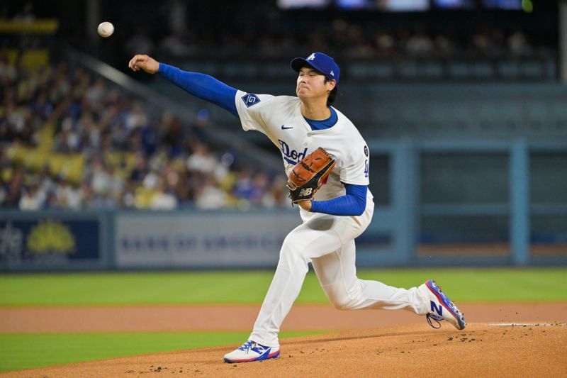 Sep 16, 2025; Los Angeles, California, USA; Los Angeles Dodgers two-way player Shohei Ohtani (17) delivers a pitch during the first inning against the Philadelphia Phillies at Dodger Stadium. Mandatory Credit: Jayne Kamin-Oncea-Imagn Images