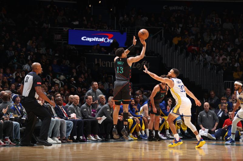 WASHINGTON, DC -? FEBRUARY 27: Jordan Poole #13 of the Washington Wizards shoots a three point basket over Stephen Curry #30 of the Golden State Warriors during the game on February 27, 2024 at Capital One Arena in Washington, DC. NOTE TO USER: User expressly acknowledges and agrees that, by downloading and or using this Photograph, user is consenting to the terms and conditions of the Getty Images License Agreement. Mandatory Copyright Notice: Copyright 2024 NBAE (Photo by Stephen Gosling/NBAE via Getty Images)