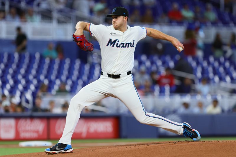 Apr 17, 2024; Miami, Florida, USA; Miami Marlins starting pitcher Trevor Rogers (28) delivers a pitch against the San Francisco Giants during the first inning at loanDepot Park. Mandatory Credit: Sam Navarro-USA TODAY Sports