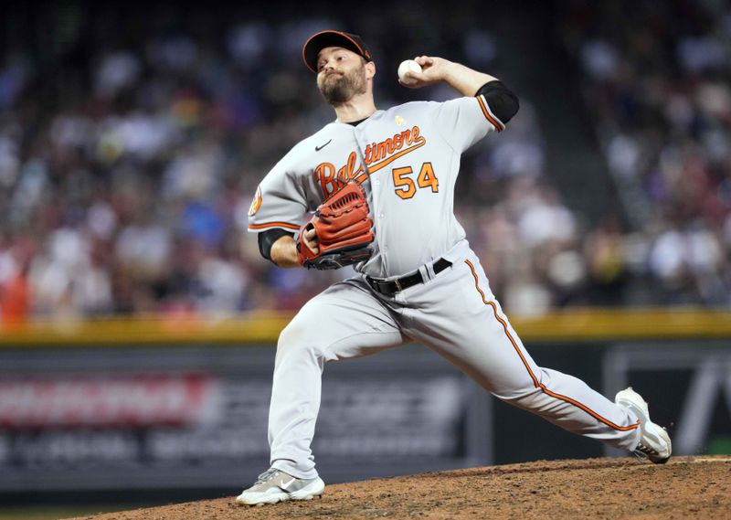 Sep 3, 2023; Phoenix, Arizona, USA; Baltimore Orioles relief pitcher Danny Coulombe (54) pitches against the Arizona Diamondbacks during the fifth inning at Chase Field. Mandatory Credit: Joe Camporeale-USA TODAY Sports