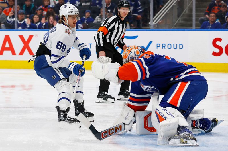 Jan 16, 2024; Edmonton, Alberta, CAN; Edmonton Oilers goaltender Stuart Skinner (74) makes a save on  on Toronto Maple Leafs forward William Nylander (88) during the third period at Rogers Place. Mandatory Credit: Perry Nelson-USA TODAY Sports