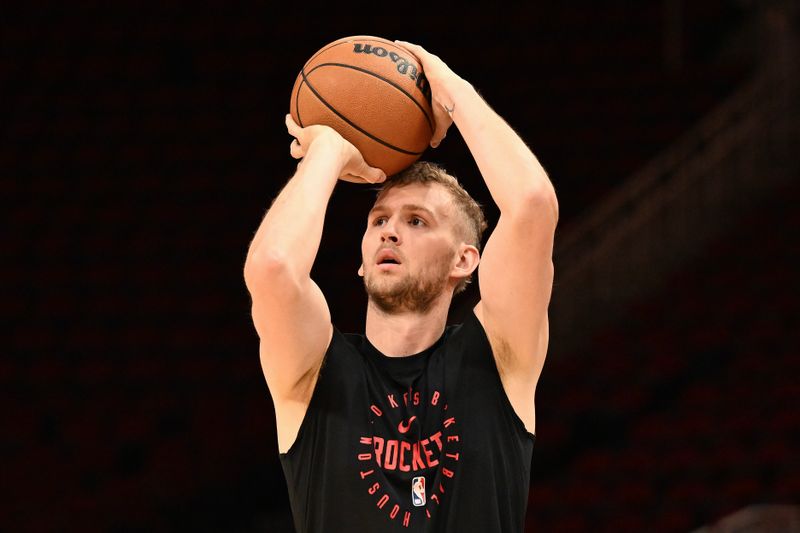 HOUSTON, TEXAS - NOVEMBER 23: Jock Landale #2 of the Houston Rockets warms up prior to the game against the Portland Trail Blazers at Toyota Center on November 23, 2024 in Houston, Texas. (Photo by Jack Gorman/Getty Images)