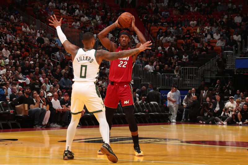 MIAMI, FL - NOVEMBER 26: Jimmy Butler #22 of the Miami Heat looks to pass the ball during the game against the Milwaukee Bucks during the Emirates NBA Cup game on November 26, 2024 at Kaseya Center in Miami, Florida. NOTE TO USER: User expressly acknowledges and agrees that, by downloading and or using this Photograph, user is consenting to the terms and conditions of the Getty Images License Agreement. Mandatory Copyright Notice: Copyright 2024 NBAE (Photo by Issac Baldizon/NBAE via Getty Images)