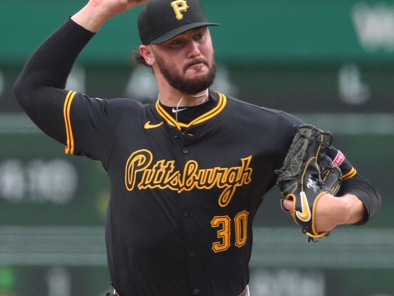 Apr 19, 2025; Pittsburgh, Pennsylvania, USA;  Pittsburgh Pirates starting pitcher Paul Skenes (30) delivers a pitch against the Cleveland Guardians during the first inning at PNC Park. Mandatory Credit: Charles LeClaire-Imagn Images