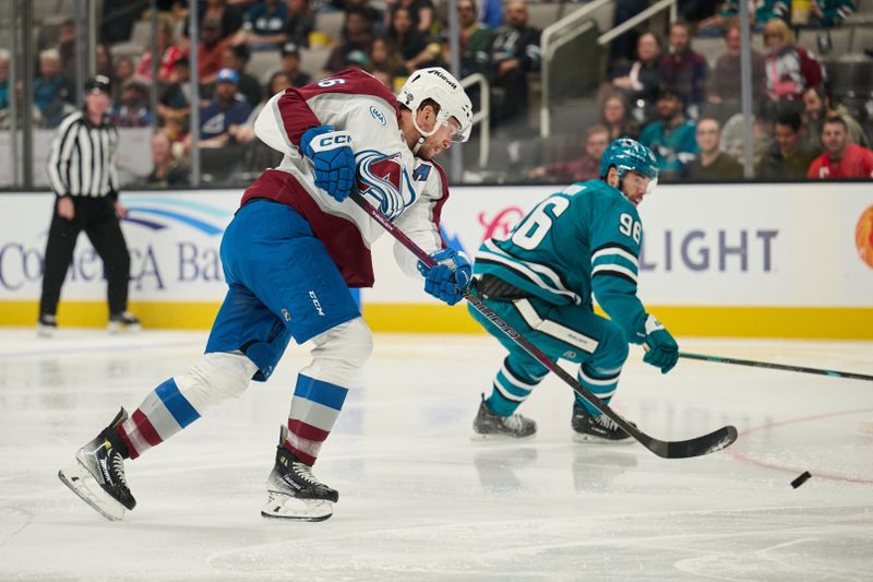 Oct 20, 2024; San Jose, California, USA; Colorado Avalanche right wing Mikko Rantanen (96) shoots the puck against the San Jose Sharks during the first period at SAP Center at San Jose. Mandatory Credit: Robert Edwards-Imagn Images