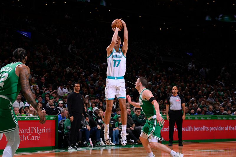 BOSTON, MA - APRIL 12: Aleksej Pokusevski #17 of the Charlotte Hornets shoots the ball during the game against the Boston Celtics on April 12, 2024 at the TD Garden in Boston, Massachusetts. NOTE TO USER: User expressly acknowledges and agrees that, by downloading and or using this photograph, User is consenting to the terms and conditions of the Getty Images License Agreement. Mandatory Copyright Notice: Copyright 2024 NBAE  (Photo by Brian Babineau/NBAE via Getty Images)