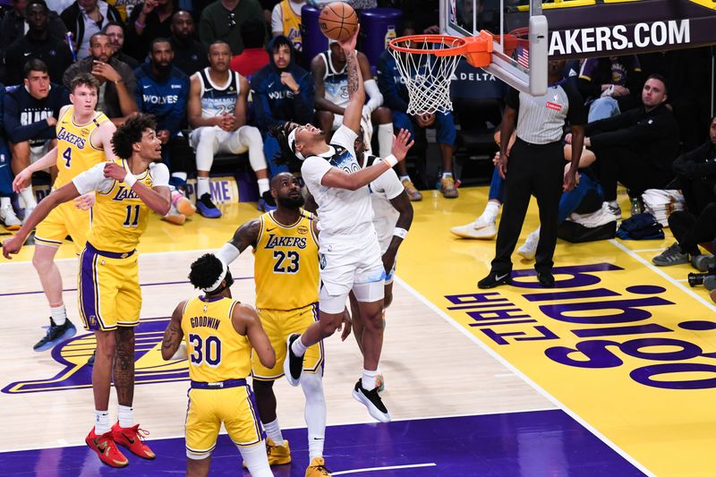 LOS ANGELES, CA - FEBRUARY 27:  Terrence Shannon Jr. #00 of the Minnesota Timberwolves drives to the basket during the game against the Los Angeles Lakers on February 27, 2025 at Crypto.Com Arena in Los Angeles, California. NOTE TO USER: User expressly acknowledges and agrees that, by downloading and/or using this Photograph, user is consenting to the terms and conditions of the Getty Images License Agreement. Mandatory Copyright Notice: Copyright 2025 NBAE (Photo by Juan Ocampo/NBAE via Getty Images)