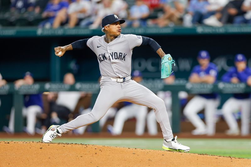 Sep 4, 2024; Arlington, Texas, USA;  New York Yankees pitcher Marcus Stroman (0) throws during the first inning against the Texas Rangers at Globe Life Field. Mandatory Credit: Andrew Dieb-Imagn Images