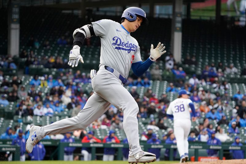 Apr 7, 2024; Chicago, Illinois, USA; Los Angeles Dodgers designated hitter Shohei Ohtani (17) hits a triple against the Chicago Cubs during the sixth inning at Wrigley Field. Mandatory Credit: David Banks-USA TODAY Sports