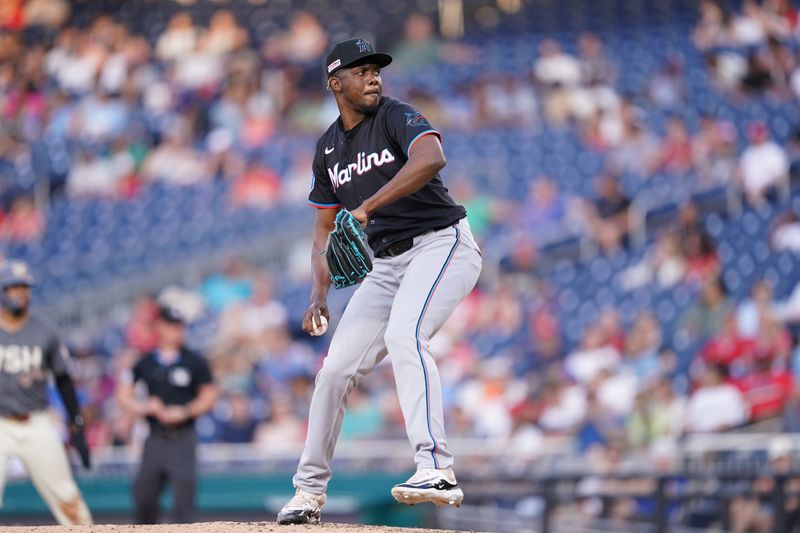 Jun 14, 2024; Washington, District of Columbia, USA; Miami Marlins relief pitcher Huascar Brazoban (31) throws the ball during the third inning against the Washington Nationals at Nationals Park. Mandatory Credit: Amber Searls-USA TODAY Sports