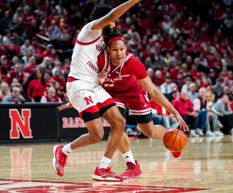 Jan 3, 2024; Lincoln, Nebraska, USA; Indiana Hoosiers forward Malik Reneau (5) drives against Nebraska Cornhuskers guard Brice Williams (3) during the second half at Pinnacle Bank Arena. Mandatory Credit: Dylan Widger-USA TODAY Sports