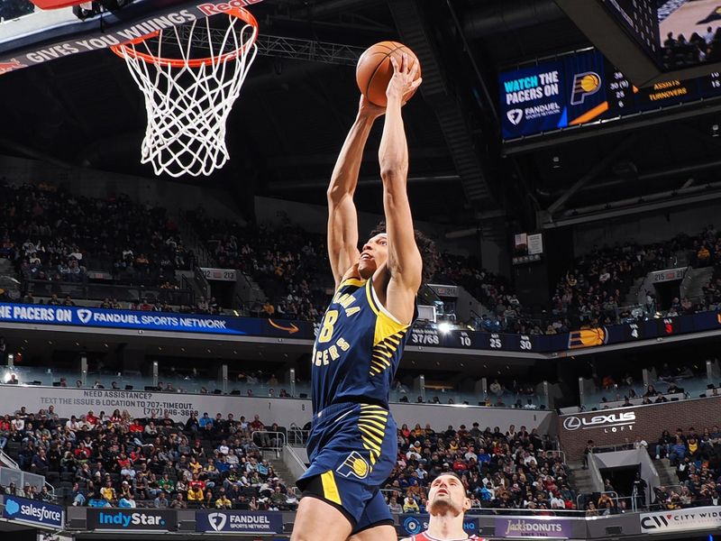 INDIANAPOLIS, IN - JANUARY 8: Enrique Freeman #8 of the Indiana Pacers drives to the basket during the game against the Chicago Bulls on January 8, 2025 at Gainbridge Fieldhouse in Indianapolis, Indiana. NOTE TO USER: User expressly acknowledges and agrees that, by downloading and or using this Photograph, user is consenting to the terms and conditions of the Getty Images License Agreement. Mandatory Copyright Notice: Copyright 2025 NBAE (Photo by Ron Hoskins/NBAE via Getty Images)