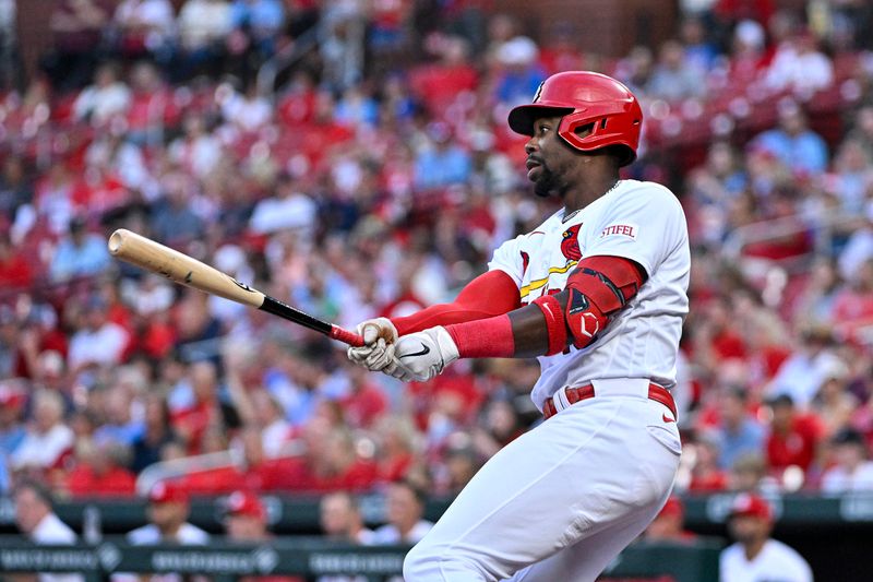 Aug 15, 2023; St. Louis, Missouri, USA;  St. Louis Cardinals right fielder Jordan Walker (18) hits a solo home run against the Oakland Athletics during the first inning at Busch Stadium. Mandatory Credit: Jeff Curry-USA TODAY Sports