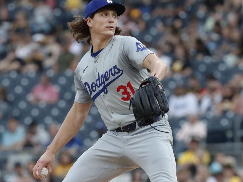 Jun 4, 2024; Pittsburgh, Pennsylvania, USA;  Los Angeles Dodgers starting pitcher Tyler Glasnow (31) delivers a pitch against the Pittsburgh Pirates during the first inning at PNC Park. Mandatory Credit: Charles LeClaire-USA TODAY Sports