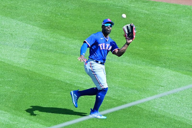 Mar 8, 2023; Salt River Pima-Maricopa, Arizona, USA; Texas Rangers right fielder Adolis Garcia (53) catches a fly ball in the third inning against the Arizona Diamondbacks during a Spring Training game at Salt River Fields at Talking Stick. Mandatory Credit: Matt Kartozian-USA TODAY Sports