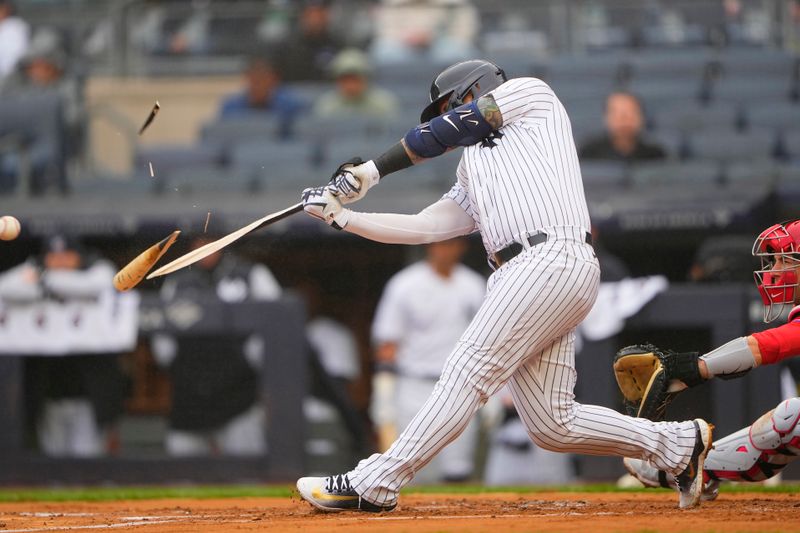 Apr 5, 2023; Bronx, New York, USA; New York Yankees designated hitter Gleybor Torres (25) hits an RBI single against the Philadelphia Phillies during the first inning at Yankee Stadium. Mandatory Credit: Gregory Fisher-USA TODAY Sports