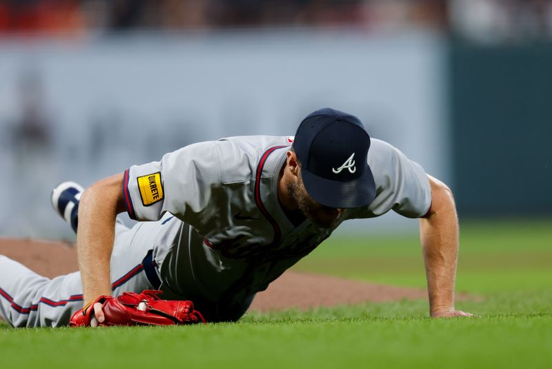 Aug 12, 2024; San Francisco, California, USA; Atlanta Braves pitcher Chris Sale (51) gets off the field after catching a line drive during the fifth inning against the San Francisco Giants at Oracle Park. Mandatory Credit: Sergio Estrada-USA TODAY Sports