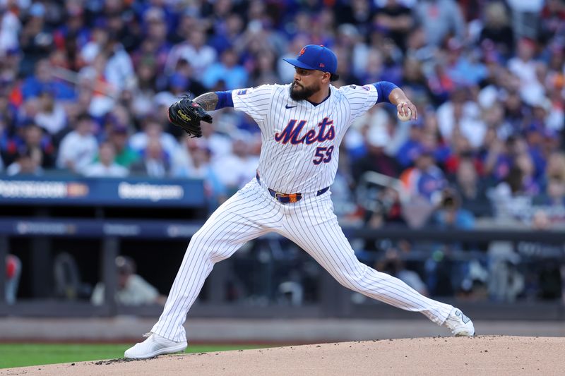 Oct 8, 2024; New York City, New York, USA; New York Mets pitcher Sean Manaea (59) pitches against the Philadelphia Phillies in the first inning during game three of the NLDS for the 2024 MLB Playoffs at Citi Field. Mandatory Credit: Brad Penner-Imagn Images