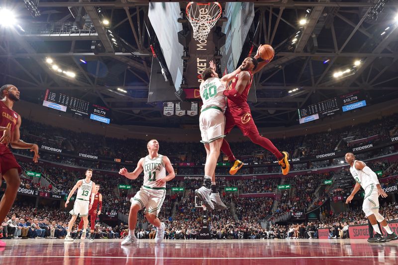 CLEVELAND, OH - DECEMBER 1: Luke Kornet #40 of the Boston Celtics blocks the ball during the game against the Cleveland Cavaliers on December 1, 2024 at Rocket Mortgage FieldHouse in Cleveland, Ohio. NOTE TO USER: User expressly acknowledges and agrees that, by downloading and/or using this Photograph, user is consenting to the terms and conditions of the Getty Images License Agreement. Mandatory Copyright Notice: Copyright 2024 NBAE (Photo by David Liam Kyle/NBAE via Getty Images)