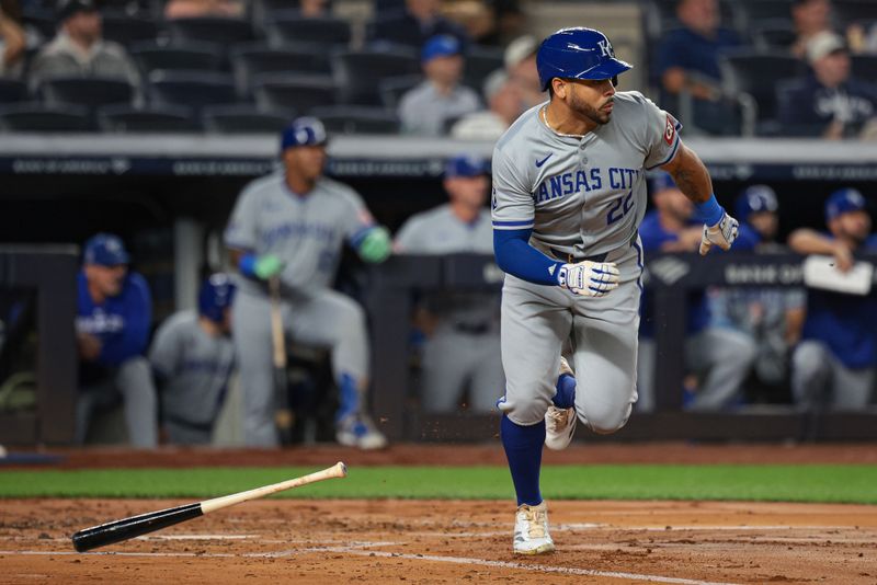 Sep 11, 2024; Bronx, New York, USA; Kansas City Royals left fielder Tommy Pham (22) singles during the third inning against the New York Yankees at Yankee Stadium. Mandatory Credit: Vincent Carchietta-Imagn Images