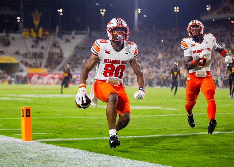 Sep 9, 2023; Tempe, Arizona, USA; Oklahoma State Cowboys wide receiver Brennan Presley (80) celebrates after scoring a touchdown against the Arizona State Sun Devils in the second half at Mountain America Stadium. Mandatory Credit: Mark J. Rebilas-USA TODAY Sports