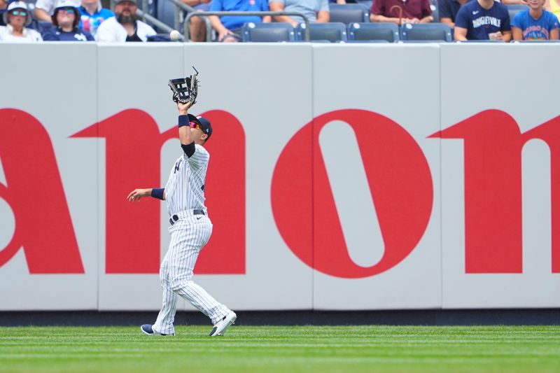 Jul 8, 2023; Bronx, New York, USA; New York Yankees left fielder Isiah Kiner-Falefa (12) catches a fly ball during the first inning at Yankee Stadium. Mandatory Credit: Gregory Fisher-USA TODAY Sports