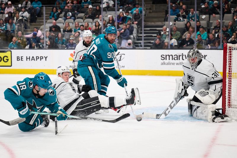 Apr 4, 2024; San Jose, California, USA; San Jose Sharks right wing Filip Zadina (18) shoots the puck against Los Angeles Kings goaltender David Rittich (31) during the second period at SAP Center at San Jose. Mandatory Credit: Robert Edwards-USA TODAY Sports