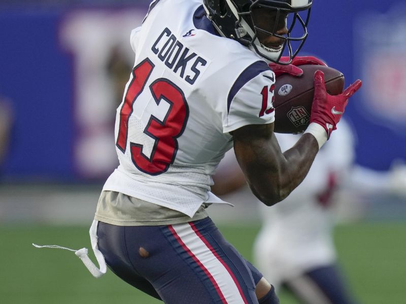 Houston Texans wide receiver Brandin Cooks (13) makes a catch during the second half of an NFL football game against the New York Giants, Sunday, Nov. 13, 2022, in East Rutherford, N.J. (AP Photo/Seth Wenig)