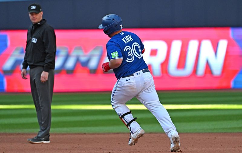 Jul 29, 2023; Toronto, Ontario, CAN;  Toronto Blue Jays catcher Alejandro Kirk (30) rounds the bases after hitting a two run home run against the Los Angeles Angels in the seventh inning at Rogers Centre. Mandatory Credit: Dan Hamilton-USA TODAY Sports