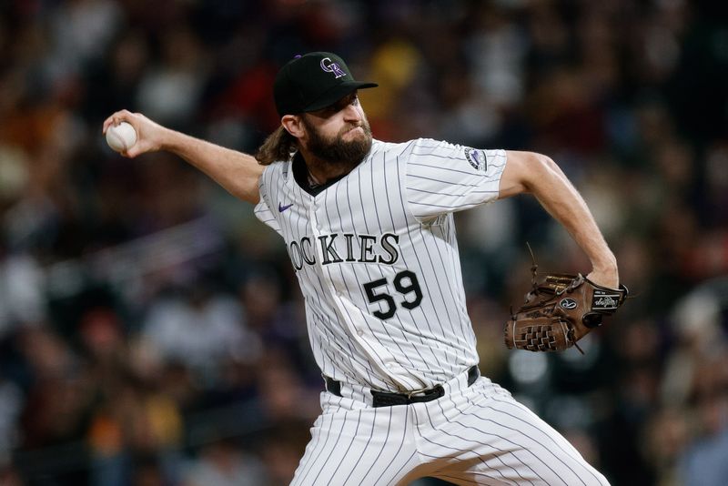 May 10, 2024; Denver, Colorado, USA; Colorado Rockies relief pitcher Jake Bird (59) pitches in the eighth inning against the Texas Rangers at Coors Field. Mandatory Credit: Isaiah J. Downing-USA TODAY Sports