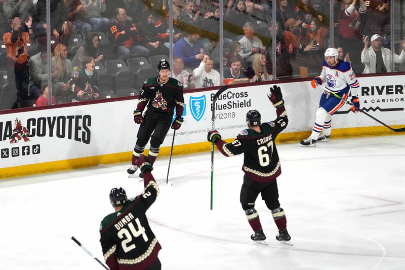 Feb 19, 2024; Tempe, Arizona, USA; Arizona Coyotes center Nick Bjugstad (17) celebrates a goal against the Edmonton Oilers during the first period at Mullett Arena. Mandatory Credit: Joe Camporeale-USA TODAY Sports