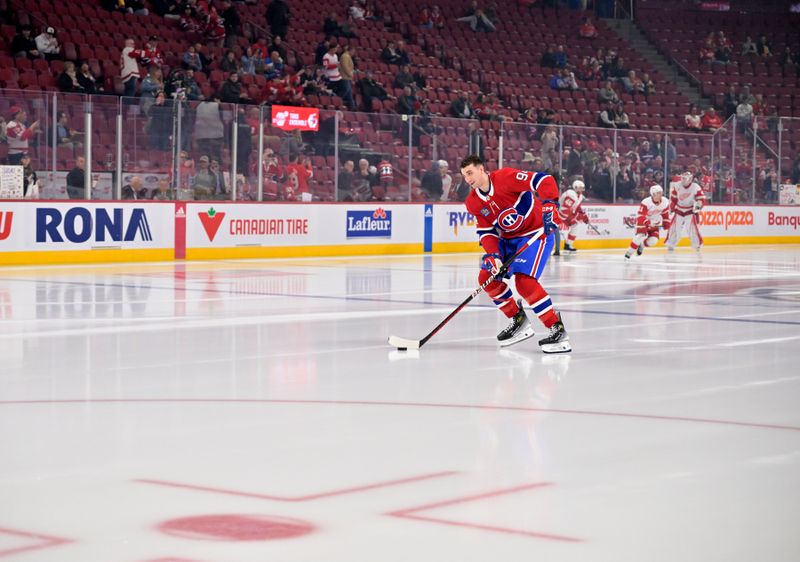 Apr 16, 2024; Montreal, Quebec, CAN; Montreal Canadiens defenseman Logan Mailloux (94) skates on his solo lap during the warmup period before the game against the Detroit Red Wings at the Bell Centre. Mandatory Credit: Eric Bolte-USA TODAY Sports