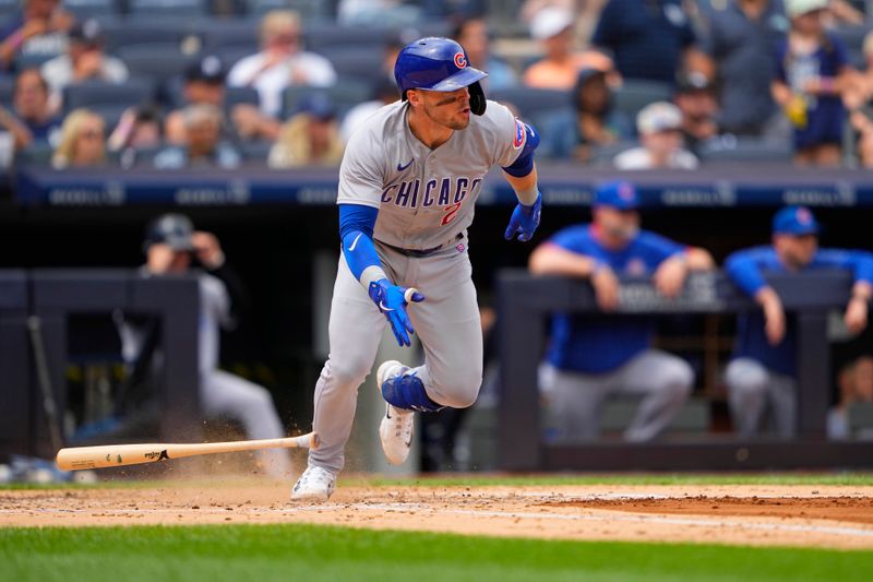 Jul 8, 2023; Bronx, New York, USA; Chicago Cubs shortstop Nico Hoerner (2) hit a RBI against the New York Yankees during the third inning at Yankee Stadium. Mandatory Credit: Gregory Fisher-USA TODAY Sports