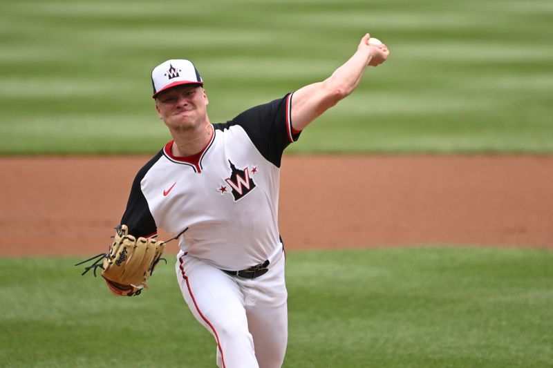 Jul 7, 2024; Washington, District of Columbia, USA; Washington Nationals starting pitcher DJ Herz (74) throws a pitch against the St. Louis Cardinals during the first inning at Nationals Park. Mandatory Credit: Rafael Suanes-USA TODAY Sports